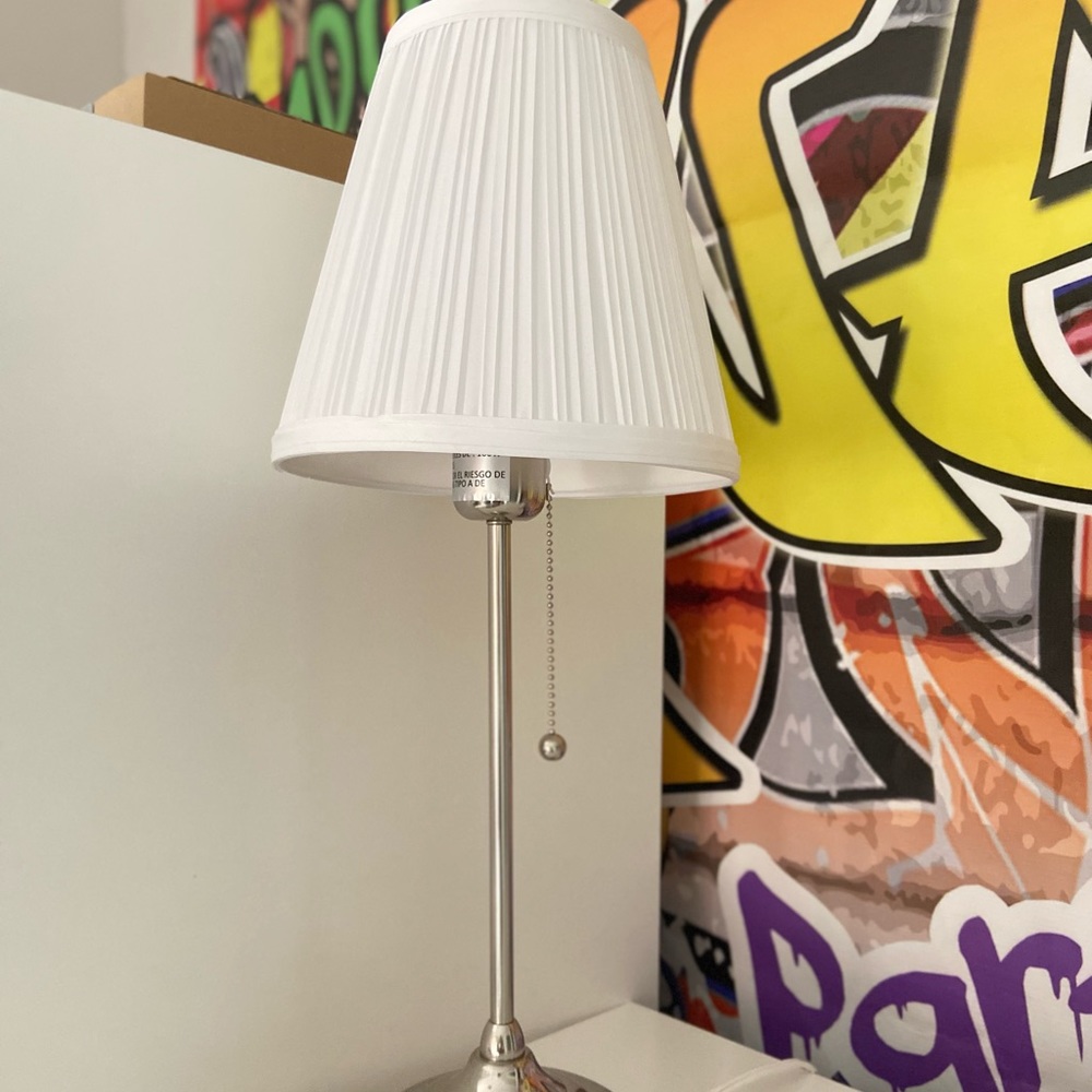 White and sliver lamp.